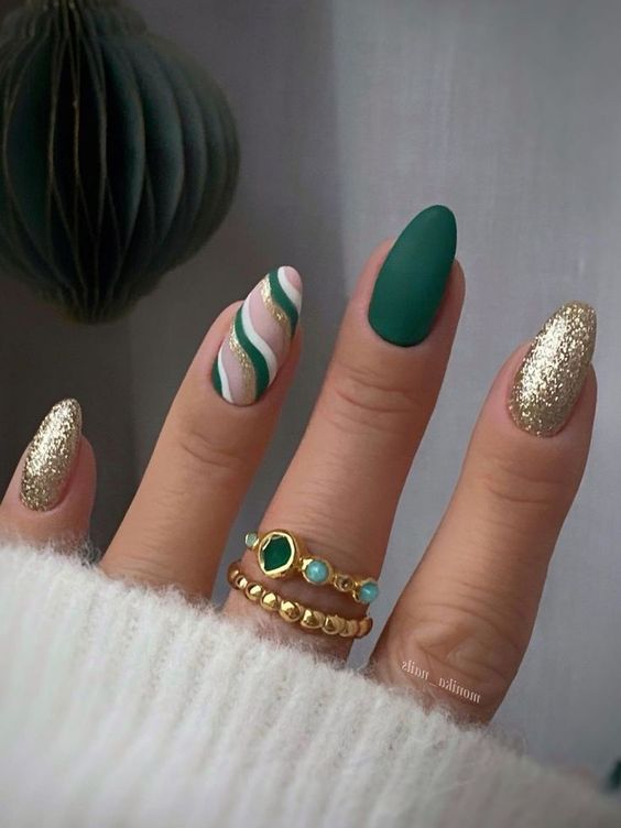 green striped and gold sparkle holiday nail ideas